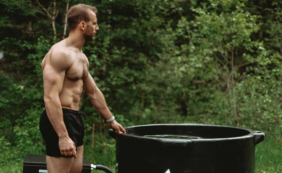 A man near his HD Pro ice bath removing the lid