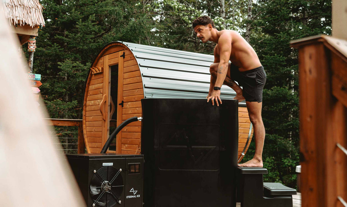 A man entering his HD Ultimate ice bath with the complete bundle setup