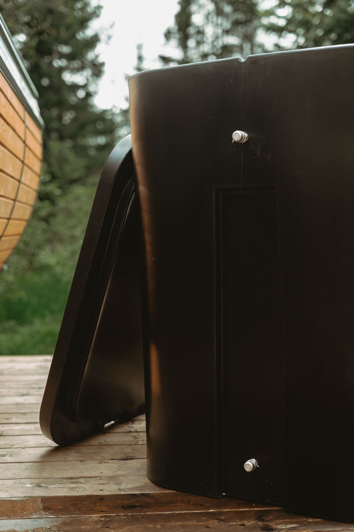 Side view of the HD Ultimate Ice Bath on a porch